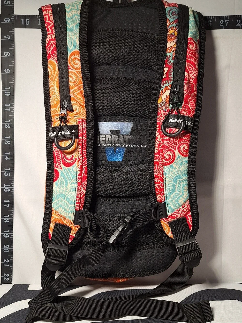 Vibedration Hydration Backpack w/o bladder -turquoise/orange pattern - Used